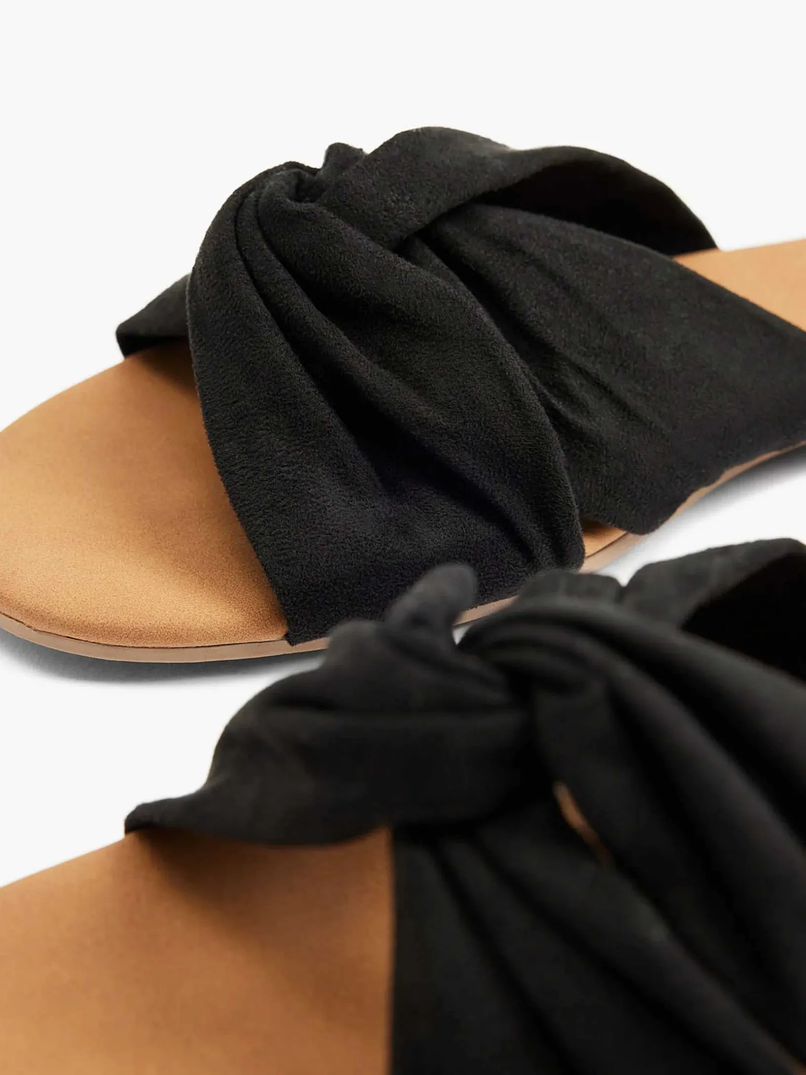 Zwarte Slipper Knoop